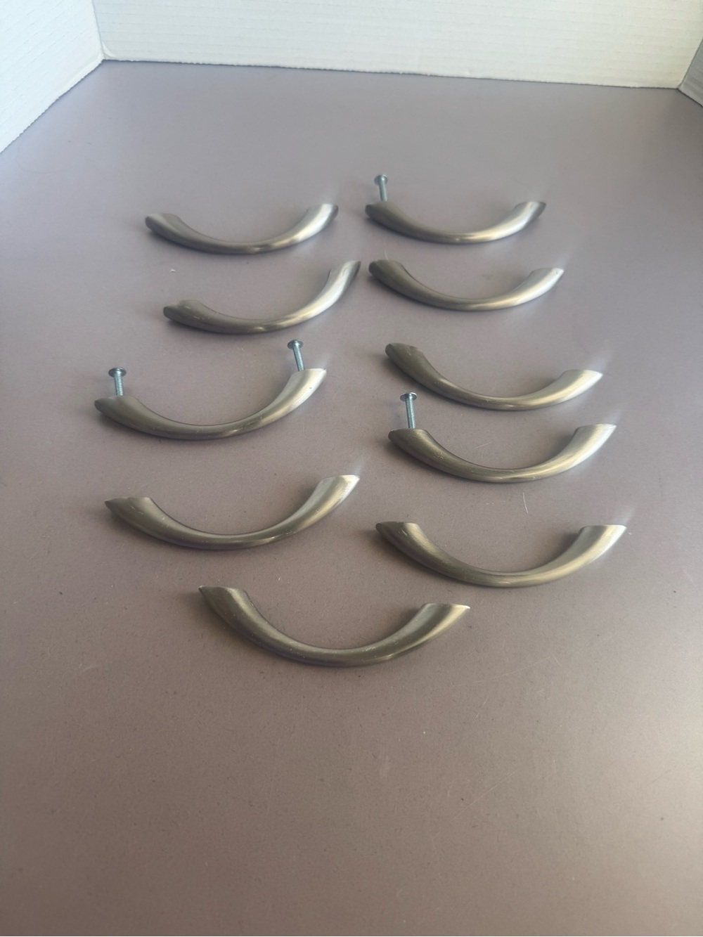 Set of 10 Curved Cabinet Drawer Pulls in Brushed Nickel